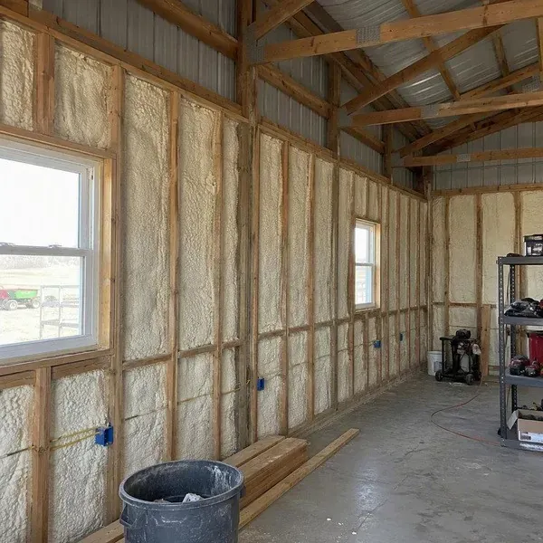 Farm workshop with open framed walls ready for spray foam