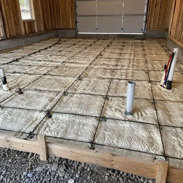 Spray foam laid under a future heated garage floor slab