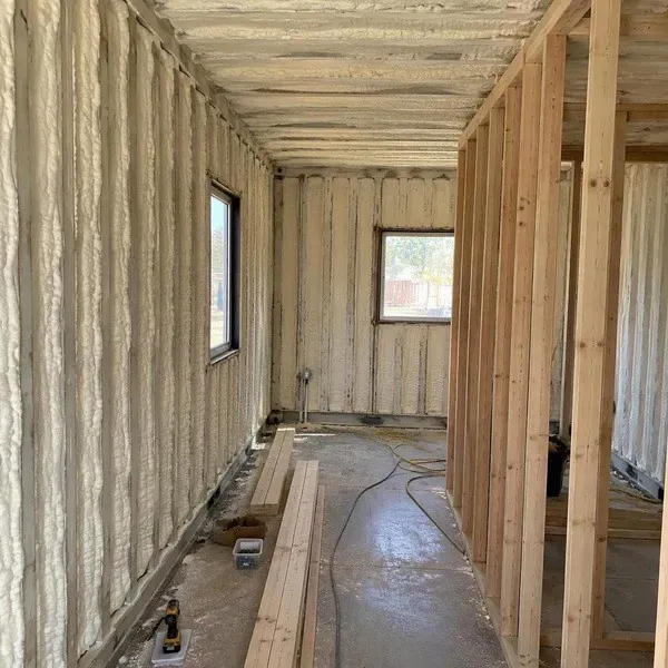 Insulated shipping container with interior partition framing started