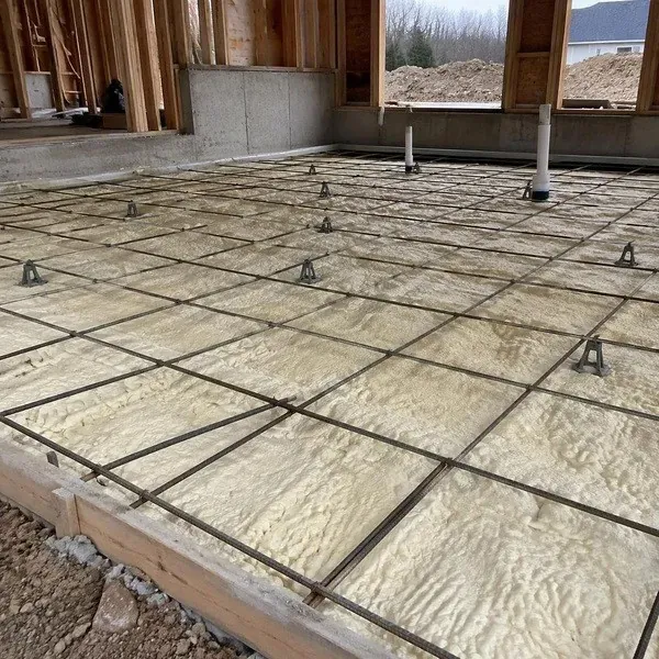 Continuous underslab spray foam with rebar ready for a concrete pour